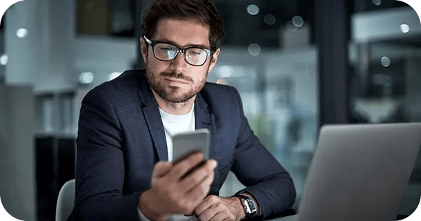 an image of a businessman browsing on his smartphone