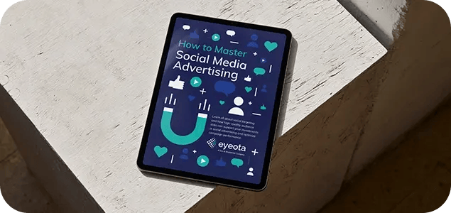 a picture of the Eyeota eBook open on a tablet sitting on a desk