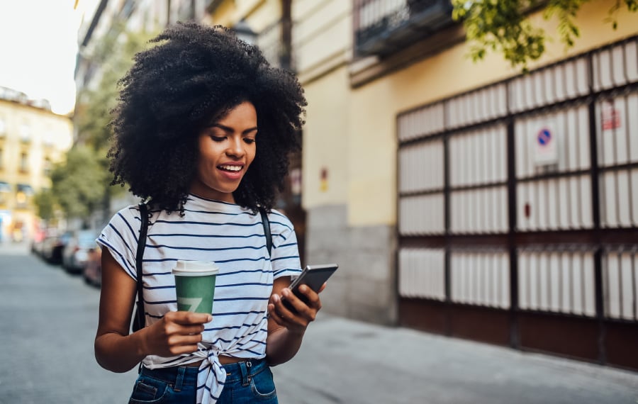 a woman looking at her smartphone