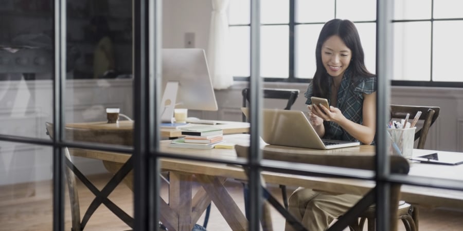 woman working on her laptop at the office