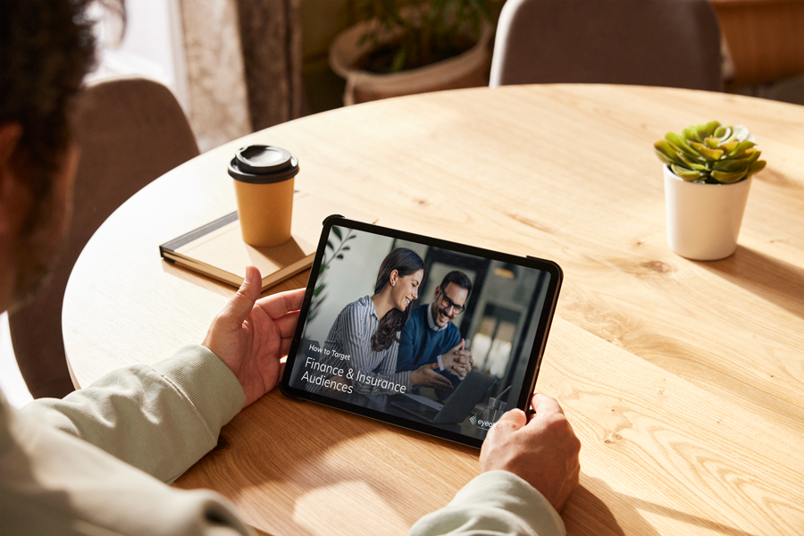 person looking at Eyeota targeting guide on tablet