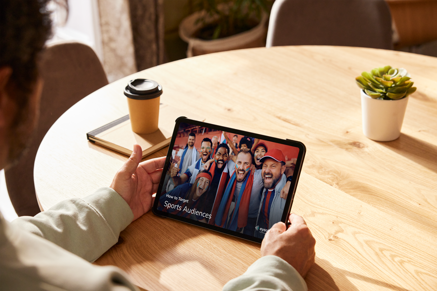 person looking at Eyeota targeting guide on tablet