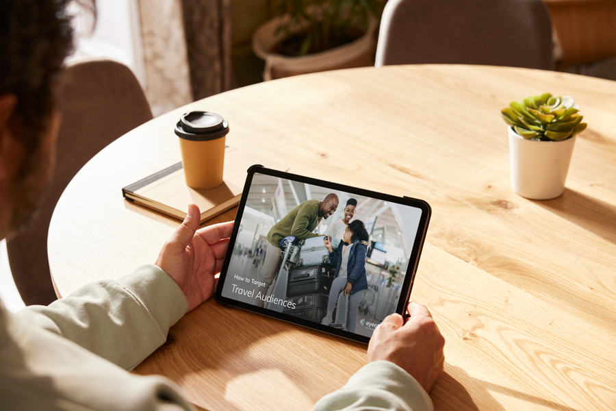 person looking at Eyeota targeting guide on tablet