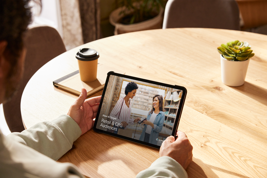 person looking at Eyeota targeting guide on tablet